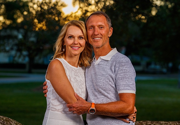 Smiling middle-aged couple enjoying benefits of TeethXpress treatment