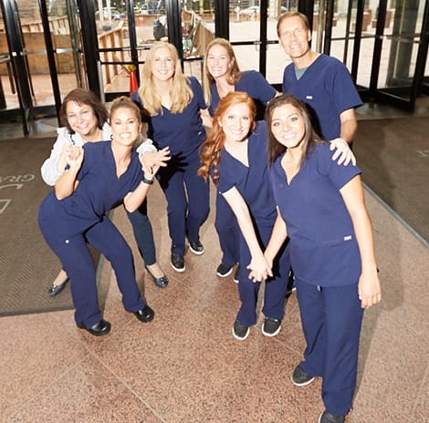 Smiling downtown Pittsburgh dentists and dental team members at Warwick Dentistry