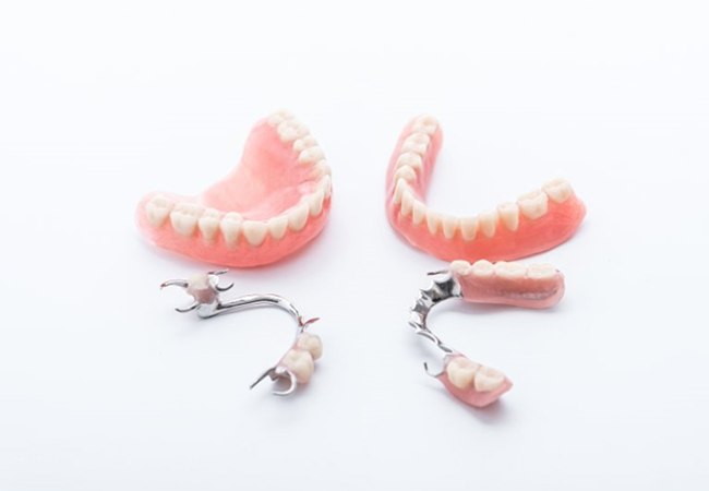 two full dentures and two partials 