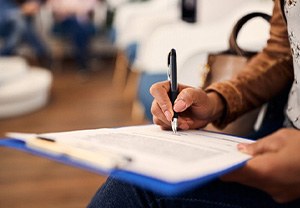 Woman filling out paperwork