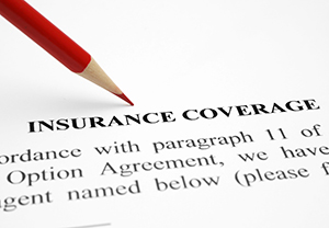 Insurance coverage policy and red pencil