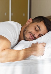 Closeup of man peacefully smiling