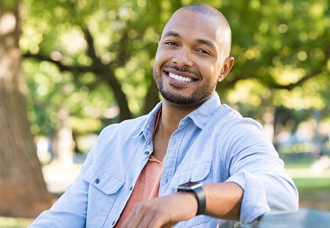 Man smiling after dental sealant treatment