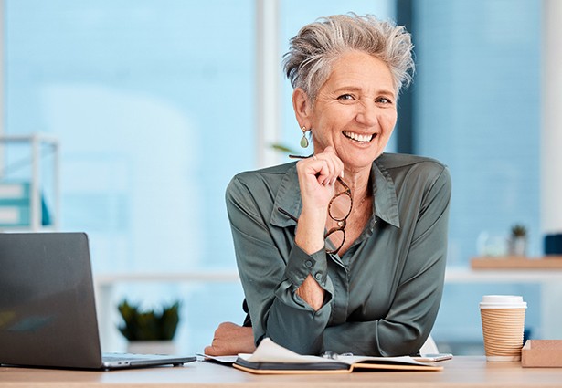 older woman with short hair smiling 