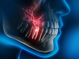 Model showing a person with tooth pain